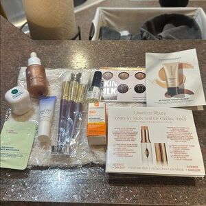 Free/$50.00 ivory fur pai impossible glow Charlotte Tilbury, brushes, foundation